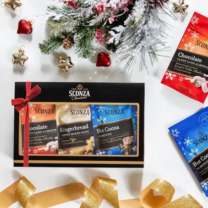 Sconza Chocolates holiday assortment featuring candy cane almonds, gingerbread mixed nuts & hot cocoa almonds.
