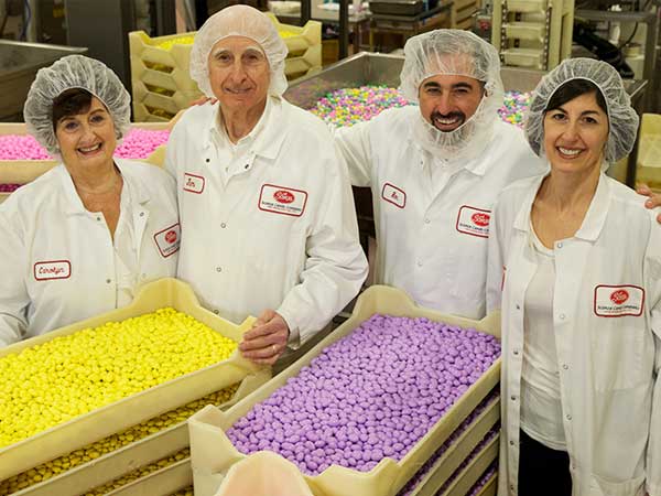 family photo of 3rd generation candy makers